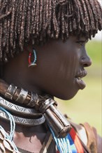 ETHIOPIA, Lower Omo Valley, Key Afir, "Weekly market, Banner woman wearing a necklace know as a