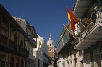 COLOMBIA, Bolivar, Cartagena, "View along Calle San Pedro Claver towards cathedral bell tower and