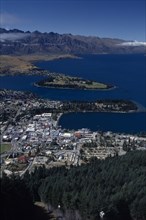 NEW ZEALAND, South Island, Queenstown, Aerial view over town on the shore of Lake Wakatipu.