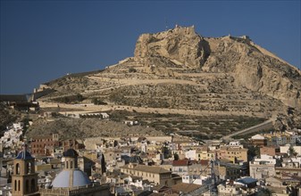 SPAIN, Pais Valenciano, Costa Blanca, "Alicante.  Castle on top of steep, rocky hillside with city