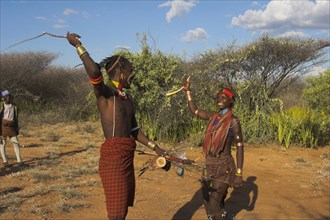 ETHIOPIA, Lower Omo Valley, Tumi, "Hama Jumping of the Bulls initiation ceremony. Man whipping