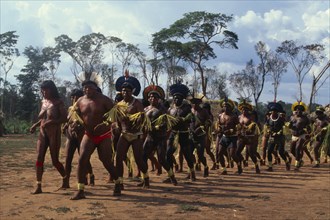 BRAZIL, Mato Grosso, Indigenous Park of the Xingu, Panar‡ men and women performing traditional