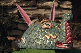 NEPAL, Annapurna Region, Larjung, Circuit Trek. Decorative painted animal totem representing The