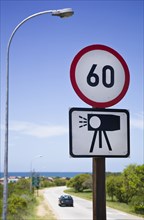 20091072 Road sign showing speed limit warning radar cameras.  African  Dominant BlueDominant GreenMedia & CommunicationsTransportRegion - Africa Jon Hicks 20091072 SOUTH AFRICA  Transport