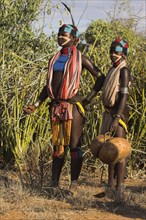 ETHIOPIA, Lower Omo Valley, Tumi, "Hamer Jumping of the Bulls initiation ceremony, Girls watching