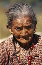 NEPAL, East, Kharang, Portrait of elderly woman in Kharang Village near the Arun River Valley