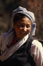 NEPAL, Kanchenjunga Trek, Near Phale, Portrait of Bhotia woman smiling