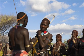 ETHIOPIA, Lower Omo Valley, Tumi, "HamerJumping of the Bulls initiation ceremony, Hamer men chat