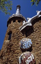 SPAIN, Catalonia, Barcelona, Guell Park sign on building at entrance to Park Guell