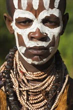 ETHIOPIA, Lower Omo Valley, Mago National Park, Karo woman with face painting