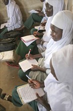 GAMBIA, Western Gambia, Tanji, "Tanji Village.  African Muslim girls wearing white headscarves