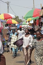 GAMBIA, Western Gambia, Serekunda, "Bakau Market, Atlantic Road.  Busy market scene with crowds of