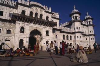 NEPAL, Janakpur, "Janaki Mandir exterior facade with street traders, beggar and crowds in square in