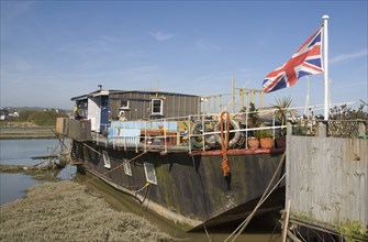 ENGLAND, West Sussex, Shoreham-by-Sea, Houseboats moored along the banks of the river adur.