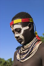 ETHIOPIA, Lower Omo Valley, Mago National Park, Karo tribe body decoration and jewellery.