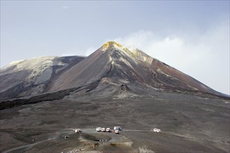 ITALY, Sicily, Mount Etna, View of active and smoking main crater of volcano and older crater with