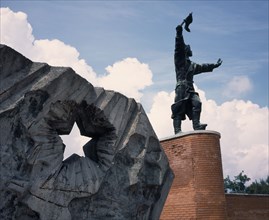 HUNGARY, Near Budapest, Statue Park. Communist statue of Captain Steinmetz and Buda Volunteers