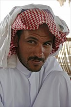 EGYPT, Sinai Desert, Ras el Satan, "Portrait of a Bedouin man with short, trimmed beard and