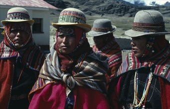 BOLIVIA, , Women wearing hats and traditional textiles