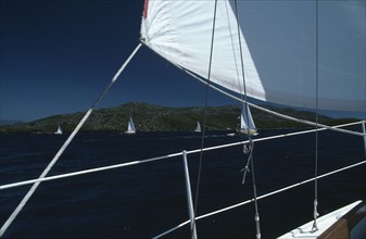 SPORT, Water Sport, Sailing, Flotilla sailing Cobra 850’s. View from deck of yacht with section of