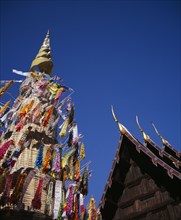 THAILAND, North, Chiang Mai, Wat Phran Tao.  Detail of pointed roof top of rare teak temple beside