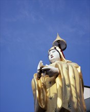 THAILAND, Bangkok, "Wat Ratchasingkhon temple on the banks of the Chao Phraya river.  ‘Guanyin’