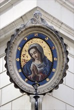 ITALY, Lazio, Rome, 18th Century mosaic of the Madonna on the corner of a building in the Campo de