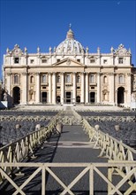 ITALY, Lazio, Rome, Vatican City The Basilica of St Peter with tourists at the entrance and empty