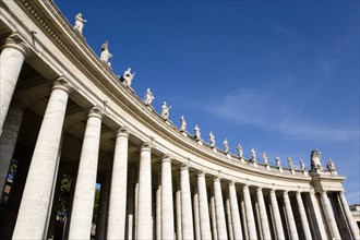 ITALY, Lazio, Rome, Vatican City The sweeping colonnade by Bernini topped with statues that circles