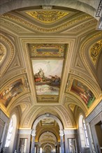 ITALY, Lazio, Rome, Vatican City Museums The highly decorated ceiling of the Gallery of the