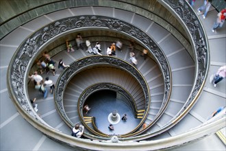 ITALY, Lazio, Rome, Vatican City Museums Tourists descending the Spiral Ramp designed by Giuseppe