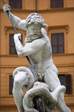 ITALY, Lazio, Rome, The central figure of the sea god Neptune fighting an octopus on the Fontana di