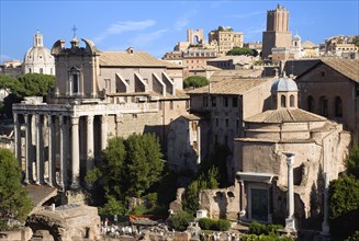 ITALY, Lazio, Rome, The Forum with the Temple of Antoninus and Faustina on the left and the domed