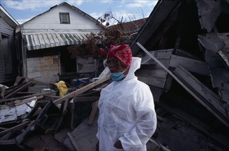 USA, Louisiana, New Orleans, "Aftermath of 2005 Hurricane Katrina, woman wearing protective