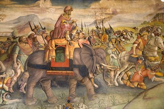 ITALY, Lazio, Rome, Painting of Hannibal on an elephant with his army on the wall of the Palazzo