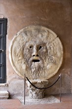 ITALY, Lazio, Rome, The Bocca della Verita or Mouth of Truth thought to be a medieval drain cover