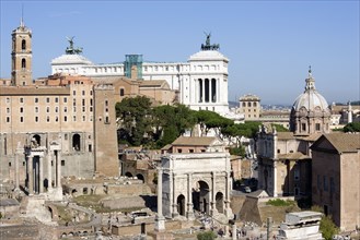 ITALY, Lazio, Rome, "The Forum and tourists with from left to right the columns of the Temple of