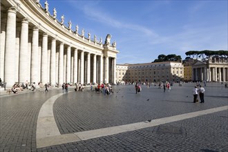 ITALY, Lazio, Rome, Vatican City Tourists in St Peter's Square beside the curving colonnade by