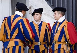 ITALY, Lazio, Rome, Vatican City Three Swiss Guards in full ceremonial uniform dress in