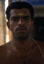 SRI LANKA, Chenkaladi   , Portrait of Hindu Tamil Temple Priest