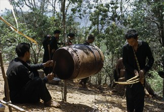 LAOS, Tribal People, Meo Tribe, Meo men playing musical instruments during the traditional ox