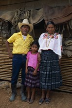 GUATEMALA, Tribal People, Q’eqchi, "Full lengh standing portrait of a Q’eqchi Indian family, a rich