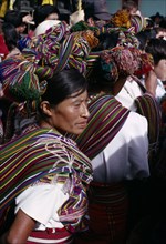 GUATEMALA, El Quiche, Nebaj, Ixil Indian women wearing traditional dress with an elaborate