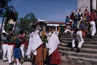 GUATEMALA, El Quiche, San Andres de Sajcabaja, Quiche Indians carrying a statue of the Patron Saint