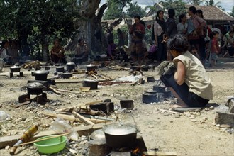 VIETNAM, Central highlands, Kontum, Vietnam War. Montagnard refugee camp in Siege of Kontum. Woman