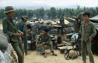 VIETNAM, Central Highlands, Kontum, "Vietnam War. Siege of Kontum. Montagnard soldiers gathered in