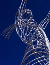 IRELAND, North, Belfast, Oxford Street. Part view of modern metal sculpture depicting female figure
