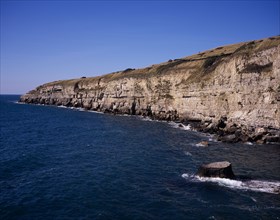 ENGLAND, Dorset, Jurassic Coastline, View west from Seacombe Quarry across the sea towards Winspit
