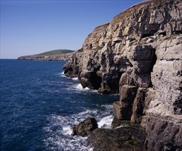 ENGLAND, Dorset, Jurassic Coastline, View west from Dancing Ledge towards Seacombe Quarry with