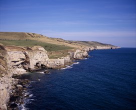 ENGLAND, Dorset, Jurassic Coastline, View east towards Seacombe Quarry and distant Anvil Point